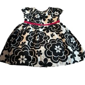 Carters floral black and white dress with a petticoat. Good condition.